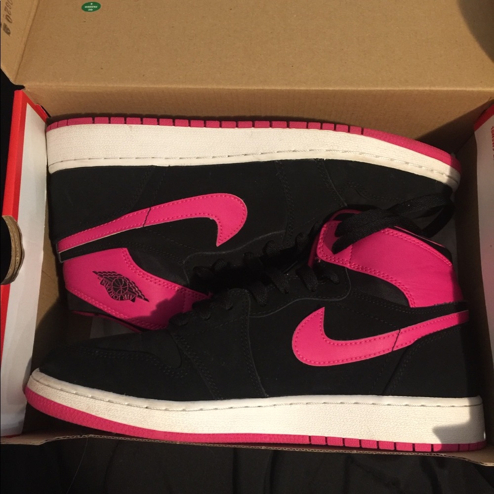 Pink and black Jordan’s